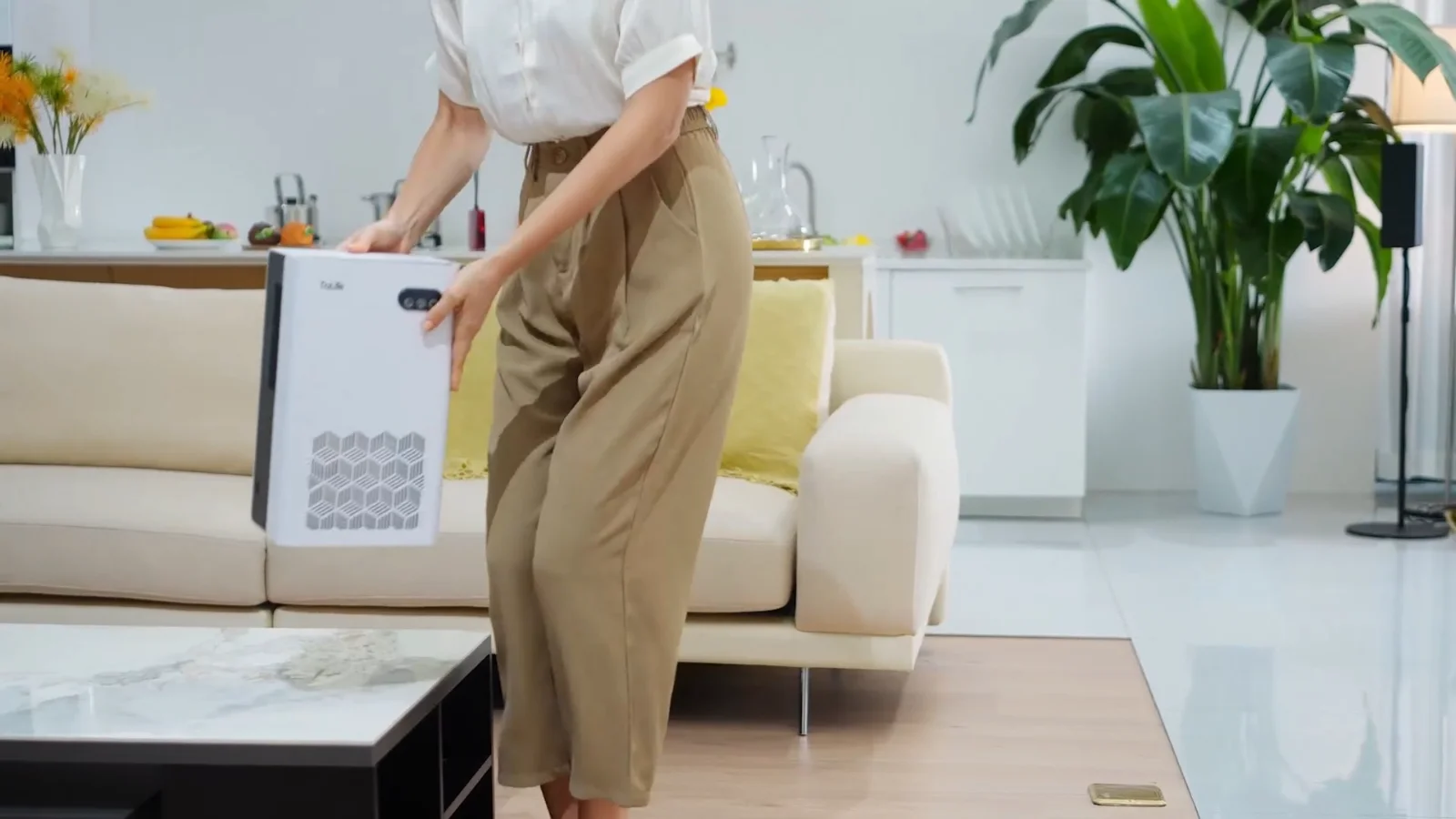 One hand moves it between rooms
